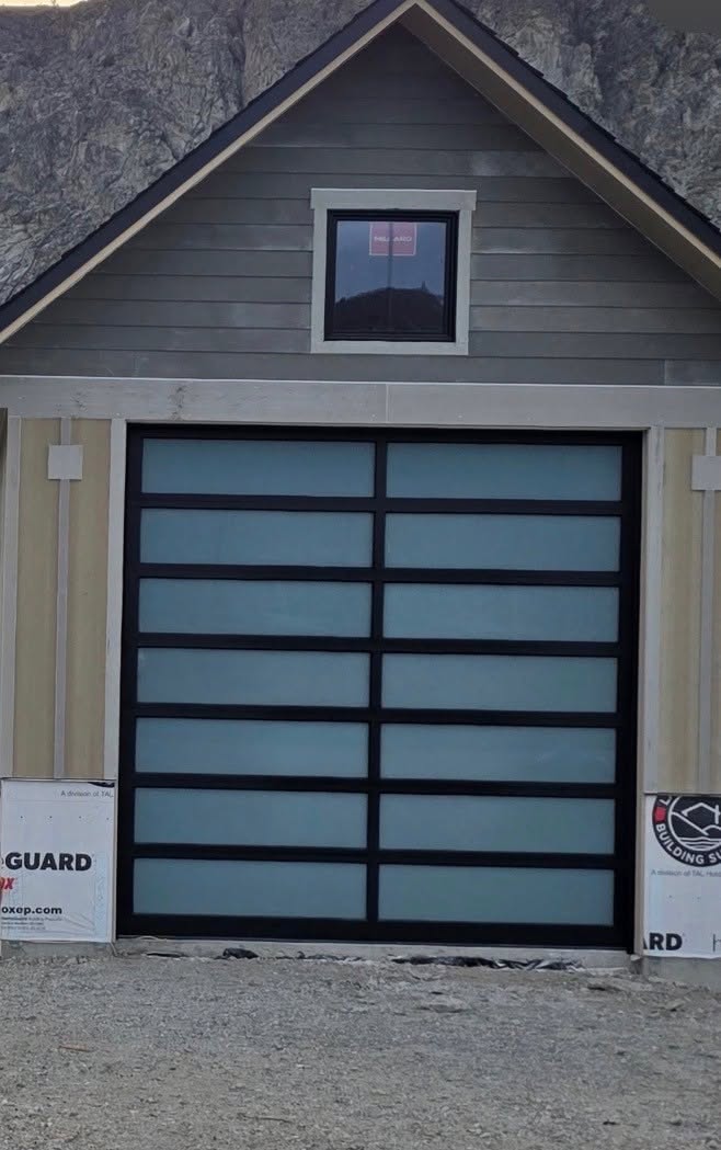 Modern glass garage door installation by L&S Contracting Services Wenatchee WA